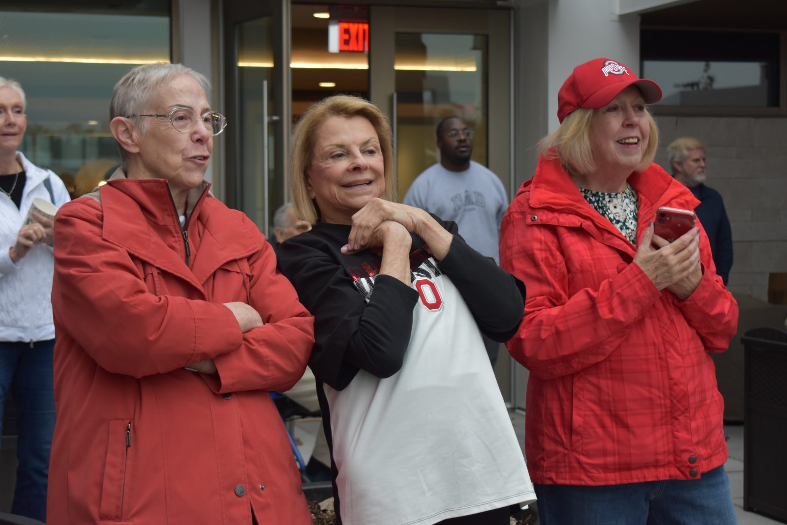 Residents of The Bailey watch The Ohio State University Marching Band perform.