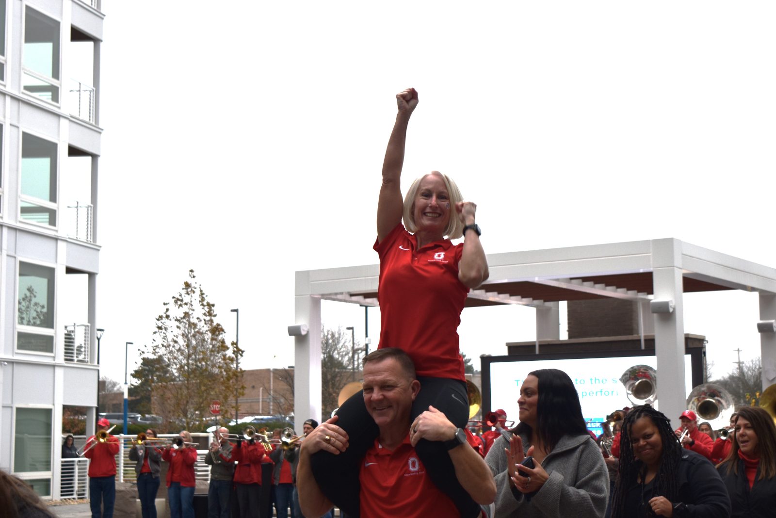 A cheerleader leads the Buckeye Spirit at The Bailey at Bridge Park.